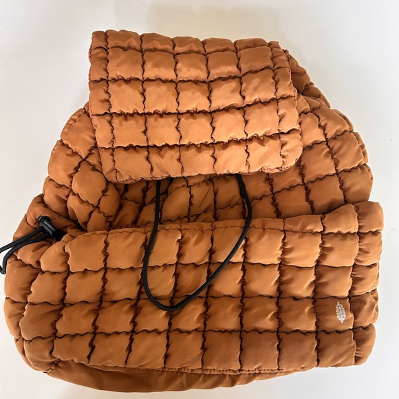 FP Movement by Free People Quilted Puffer Backpack in Rust Orange main image 6